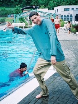 Pool swim and jump in hoodie